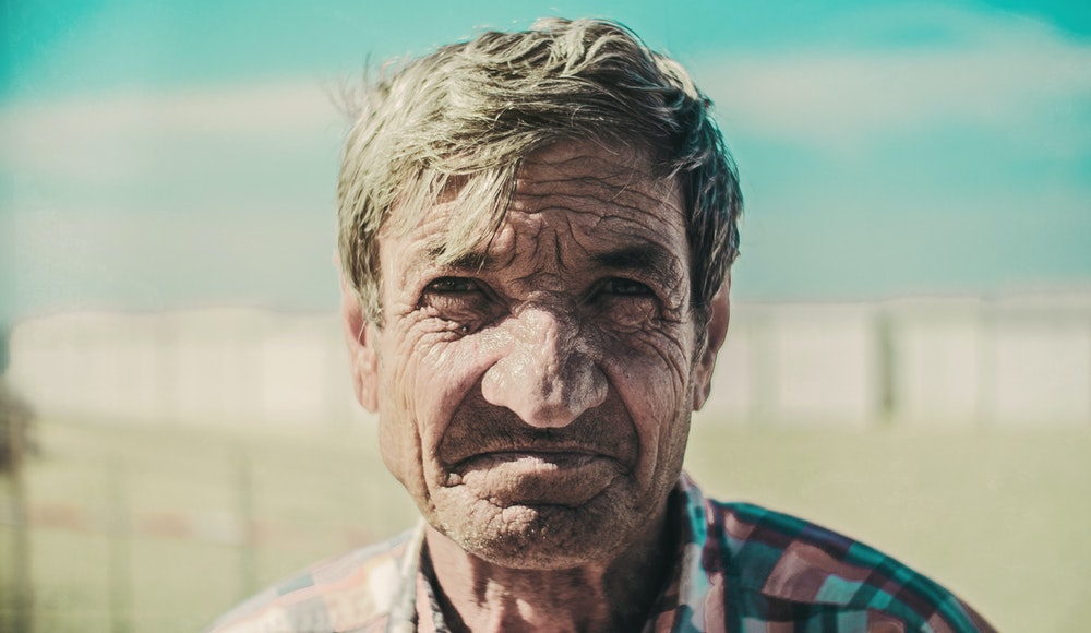 Outdoor portrait photography of a mature man