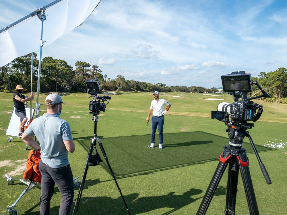 Heavy duty and light tripods in use on location